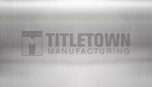 Titletown Manufacturing metal logo